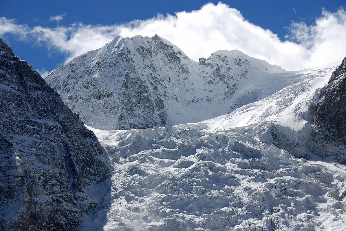 05 Gyalzen Peak Close Up From Just After Shingdip On Trek To Shishapangma Southwest Advanced Base Camp Gyalzen Peak (6151m) from just past Shingdip. The British all-women�s Himalayan Expedition was the first expedition to the Jugal Himal and the first to climb a peak in either Langtang or the Jugal. Monica Jackson and Elizabeth Stark reached the summit on May 11, 1955 via the south side from Phurbi Chyachu Glacier. Ang Temba and Mingma Gyalzen, after whom the mountain was named, also made it to the summit.